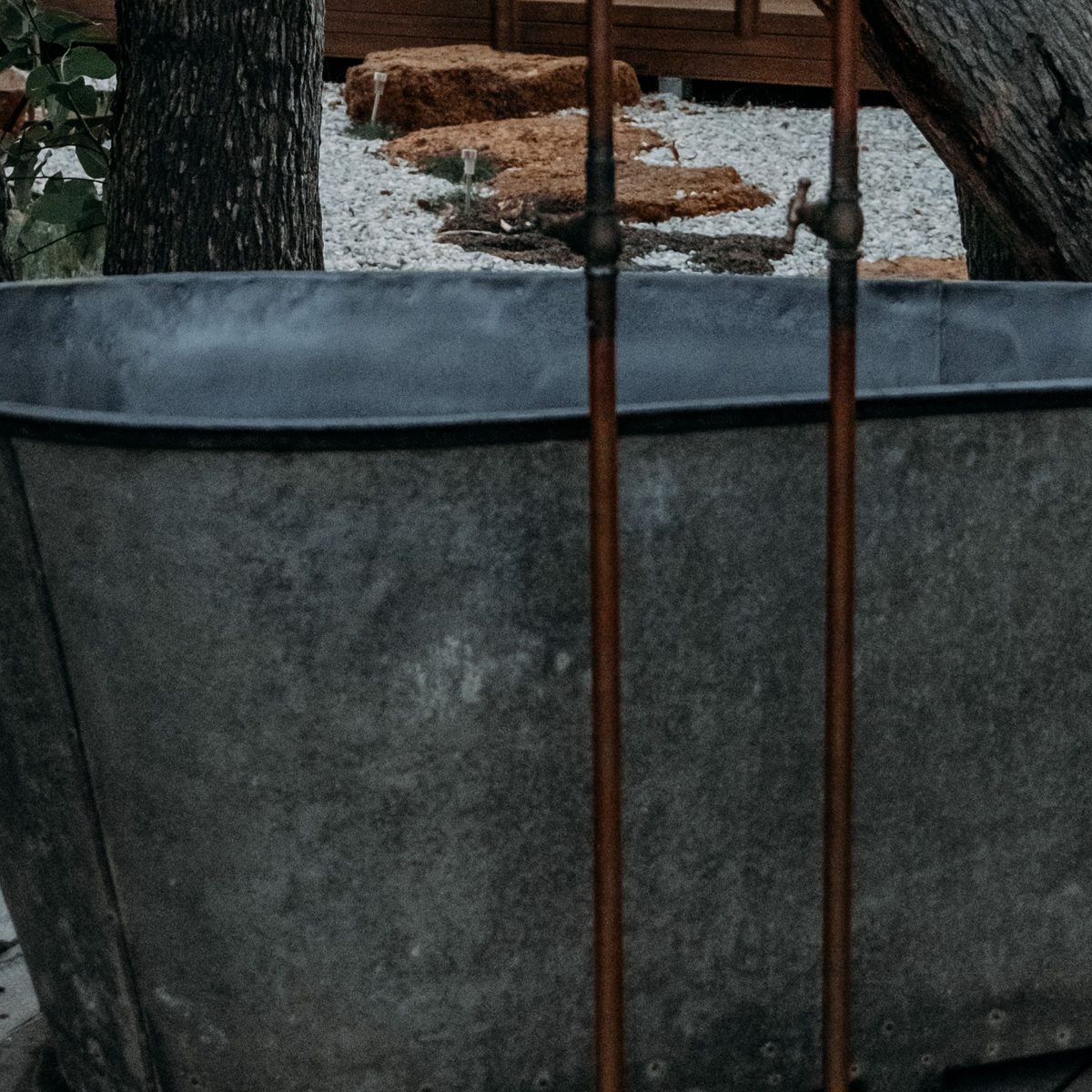 Outdoor bath tap and rim detail — Concept Project / Stock Imagery