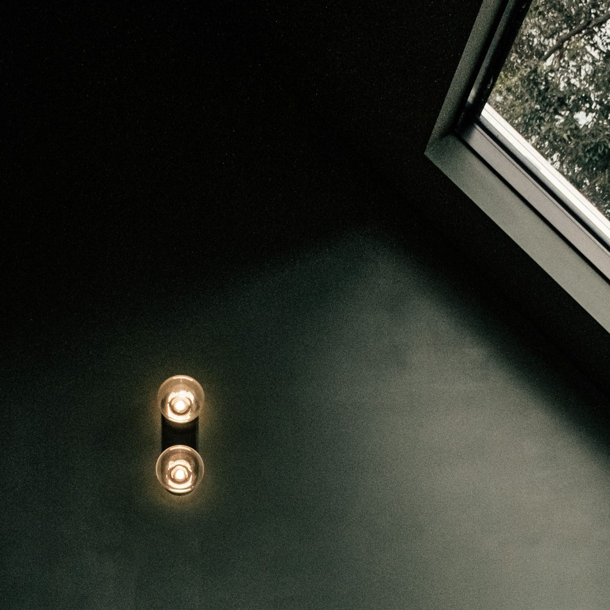 Bedside sconce light and window — Concept Project / Stock Imagery