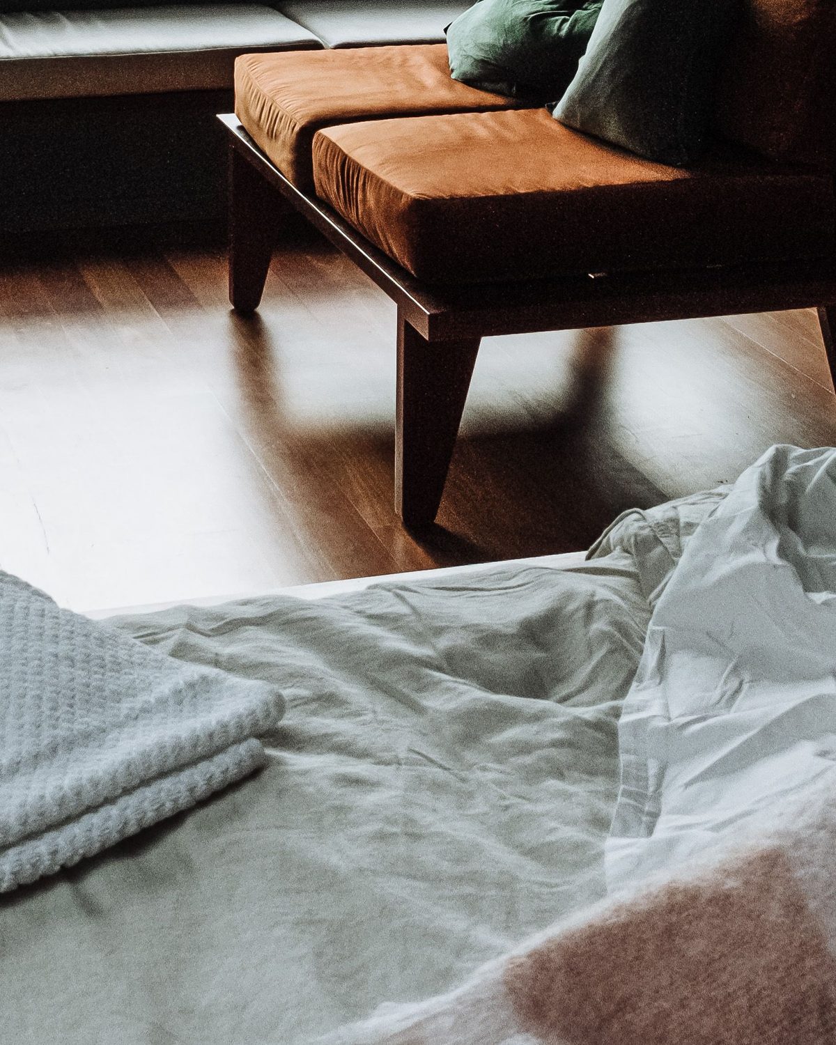 Room B sofa and folded towel detail — Concept Project / Stock Imagery