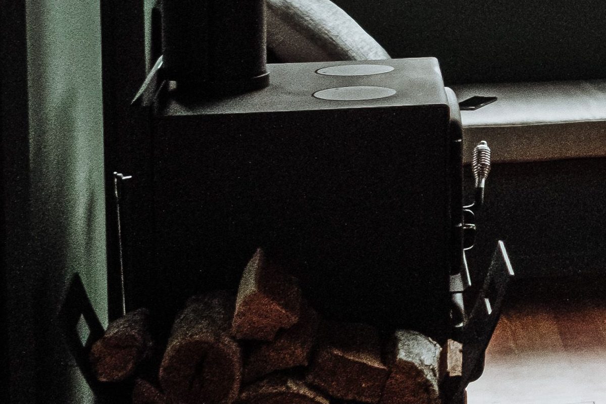 Wood stove and firewood detail — Concept Project / Stock Imagery
